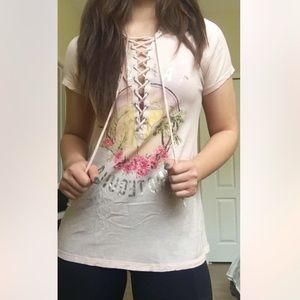 distressed peach colored graphic tee